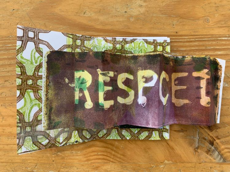 Purple and yellow jellyprinted zine page with a fold-out piece that reads "RESPECT"