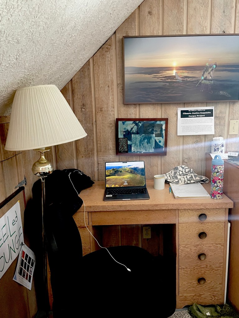 Photo credit: Susanne
A workspace at the FEELed Lab, with an oracle card tucked into a picture frame